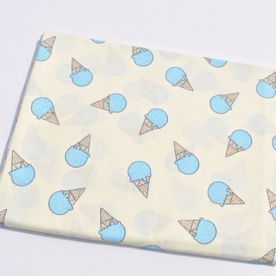 Fabric 100% cotton "Blue ice cream" on a milky background, size 50x75cm