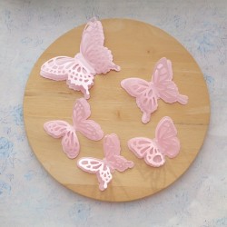 Cutting down a butterfly pink designer paper mother of pearl 290 gr.