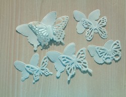Cutting down a butterfly soft blue designer paper mother of pearl 125 gr.